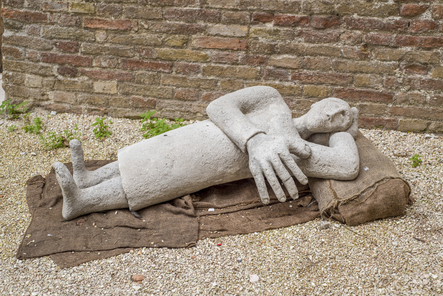 Sleeping person statue