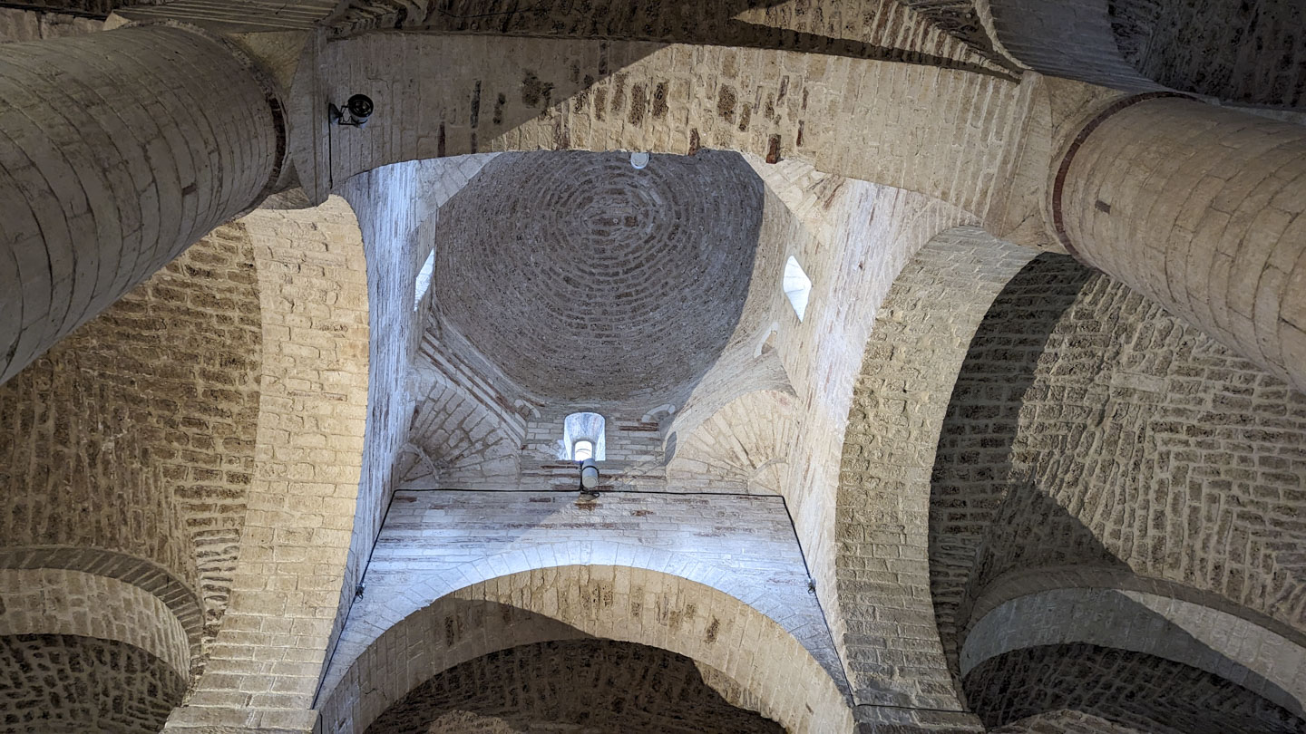 A view of the abbey ceiling, with small windows on the sides