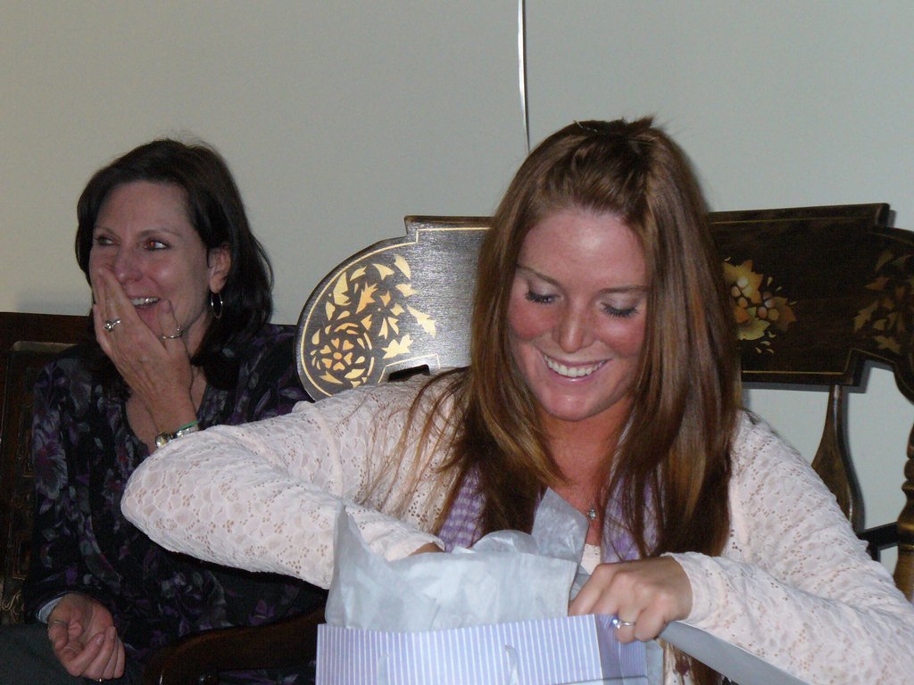 Sue with Fallyn opening a gift