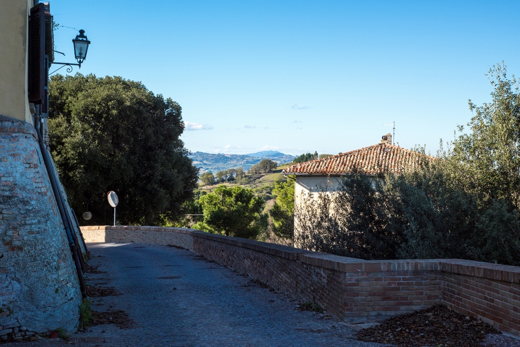 Road entry into Sant'Angelo with sharp curve