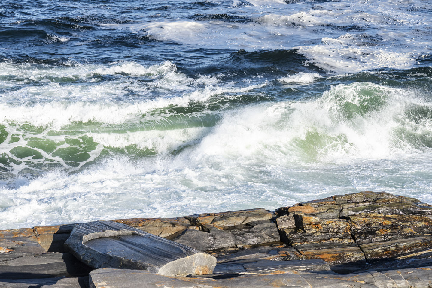 waves at Pemaquid showing intense sea-green color