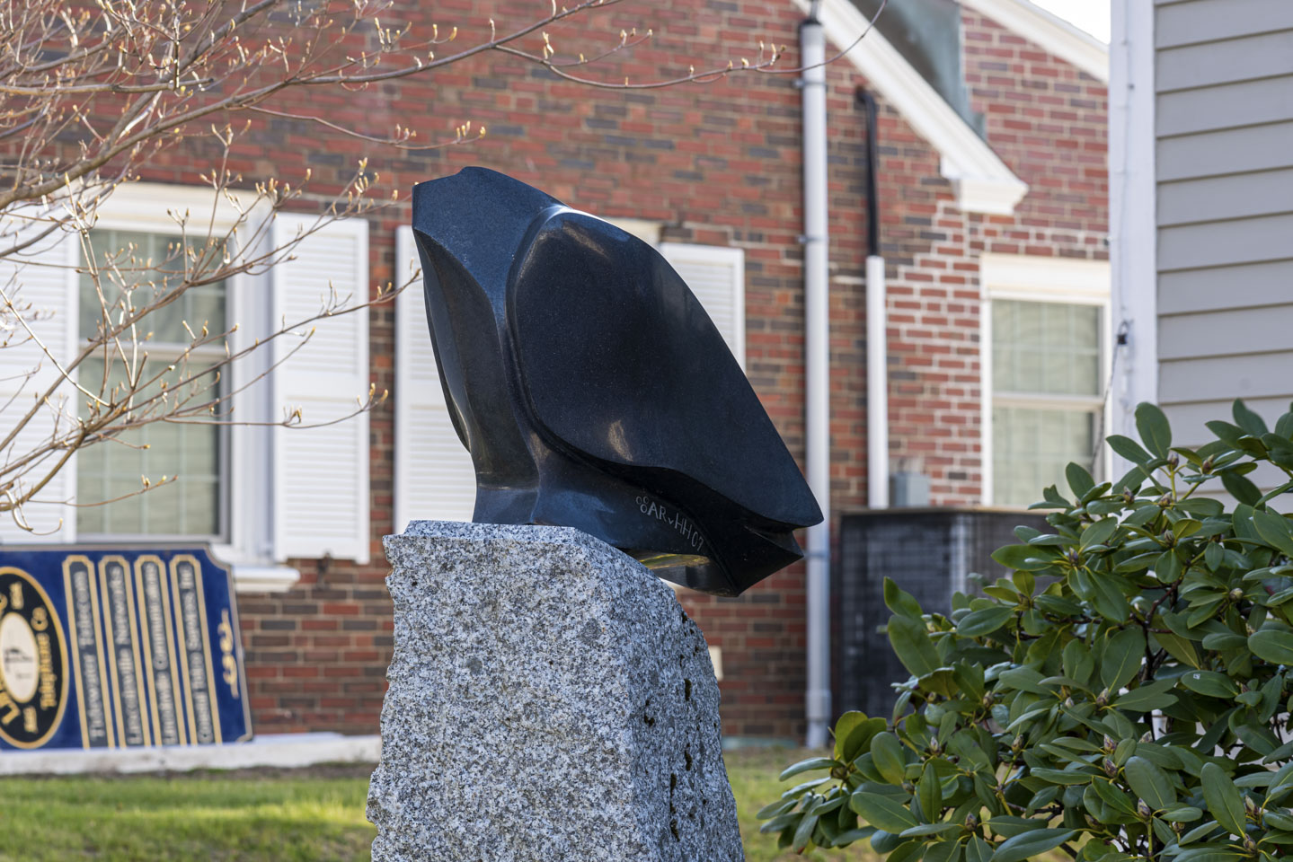 sculpture of black owl