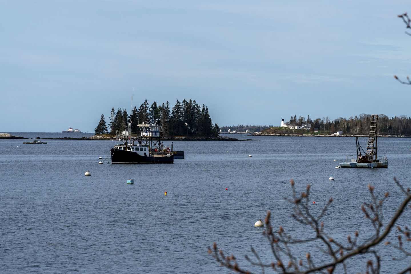 Burnt Island Light and Cuckolds viewed from Tugboat Inn parking area