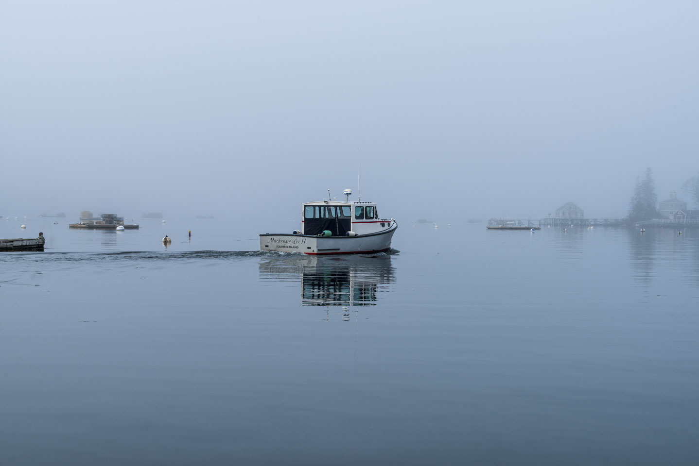 The boat Mackenzie Lee II, Squirrel Island, heading out in the fog