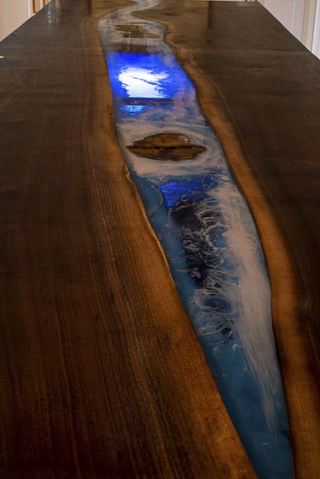 Custom table of wood and resin at Topside Inn