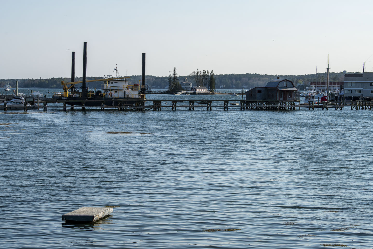 View across water to the Boothbay Harbor footbridge, which is under reconstruction