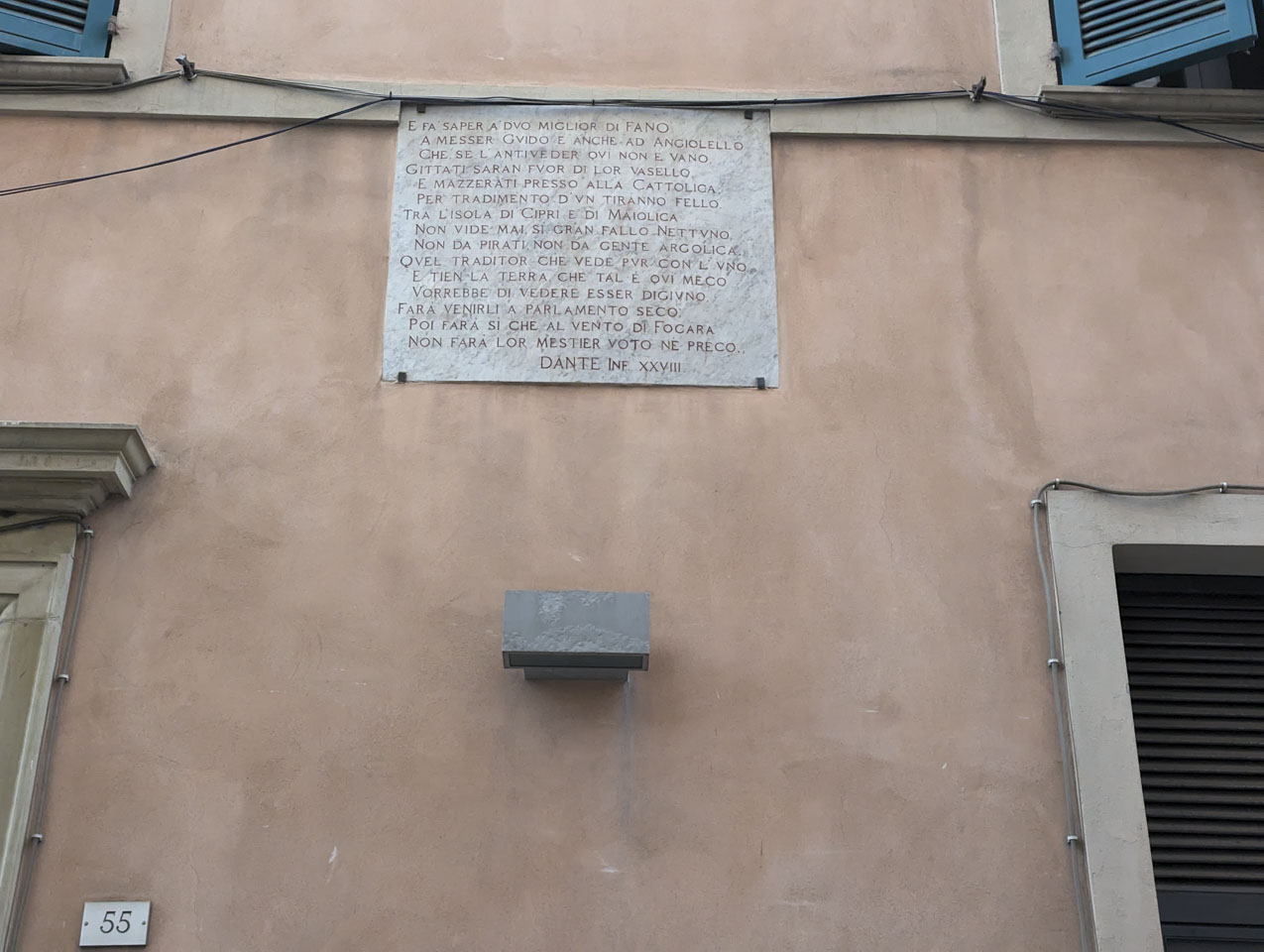 A plaque that quotes Dante
