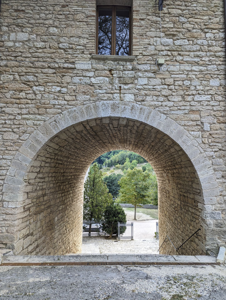 an arched passageway on Fonte Avellana