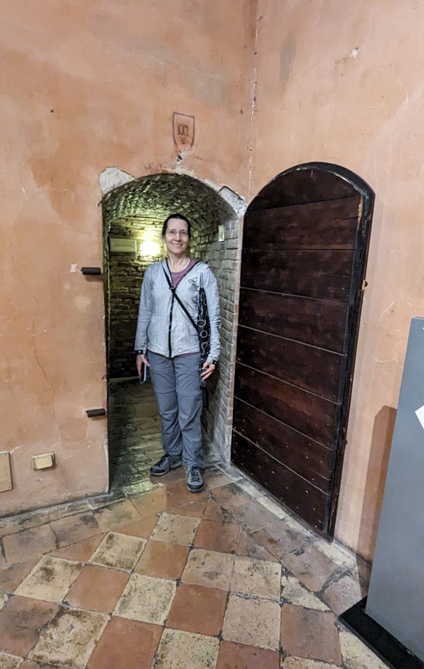 Anne standing in a doorway with little head clearance