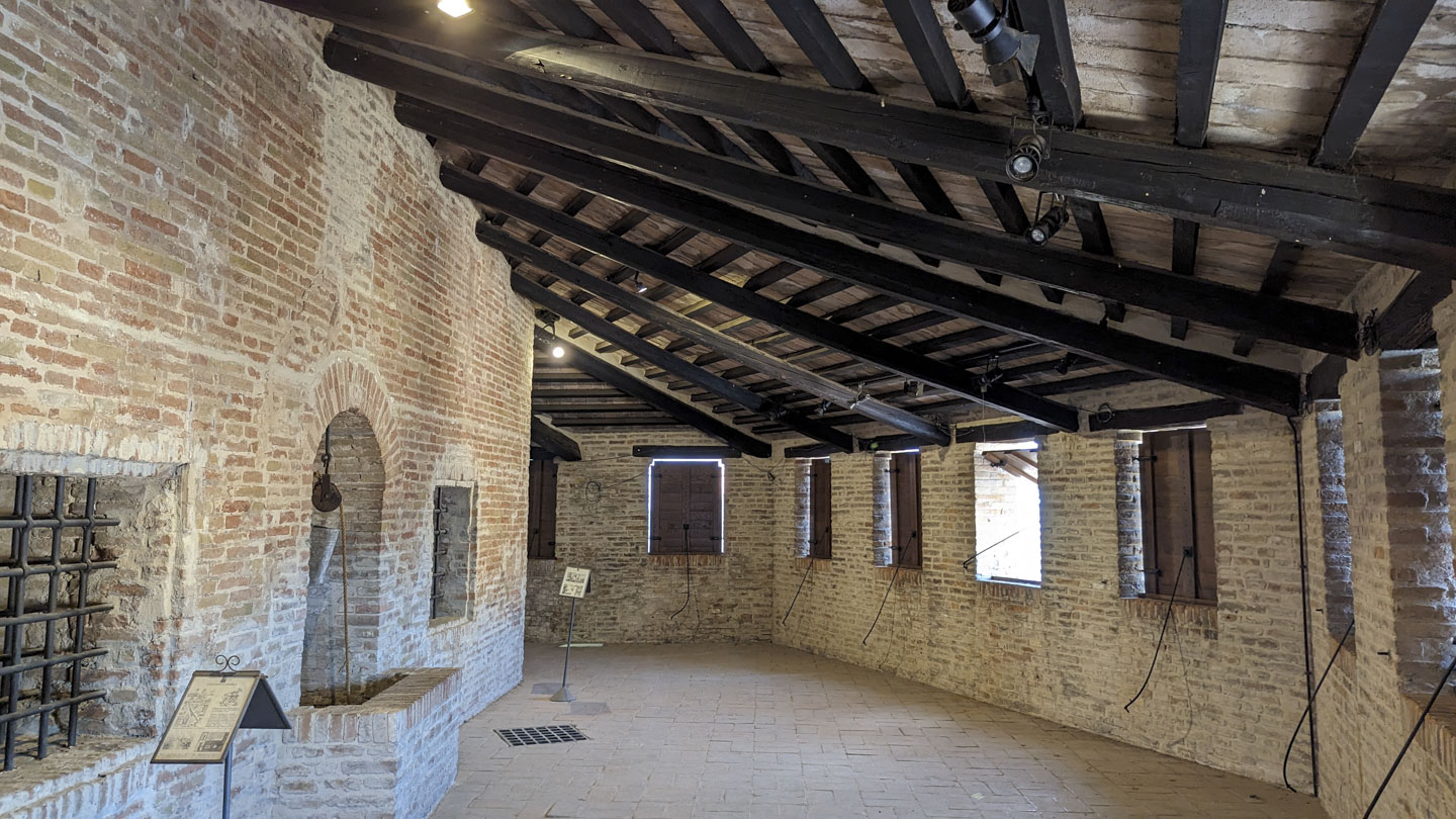The top floor of the Rocca with the windows and roof structure clearly visible