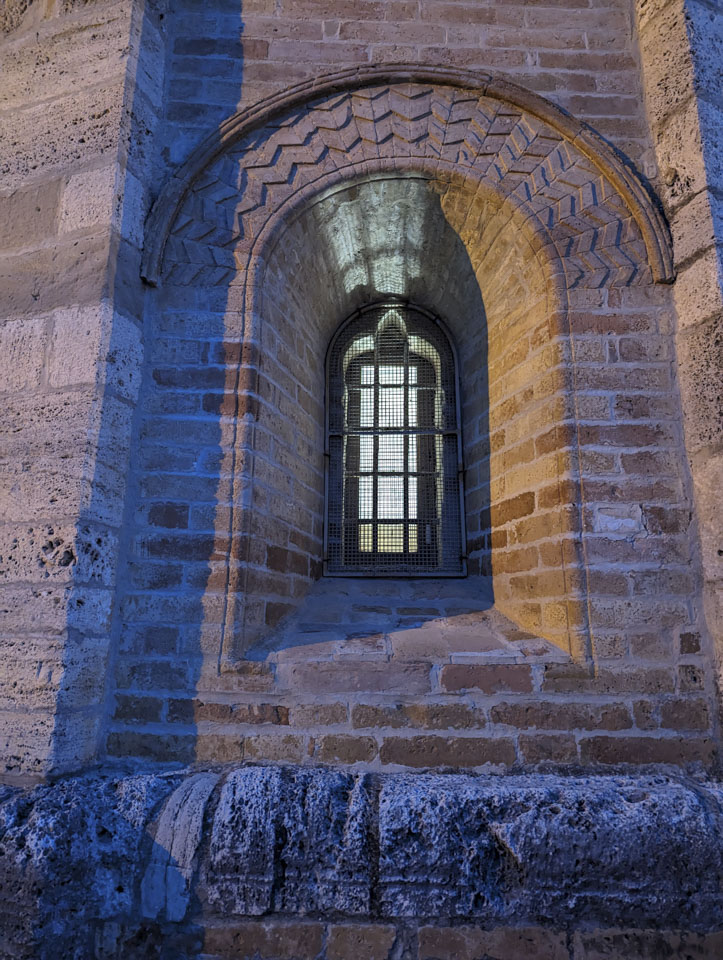 A window of Chiesa St. Maria della Rocca in Offida