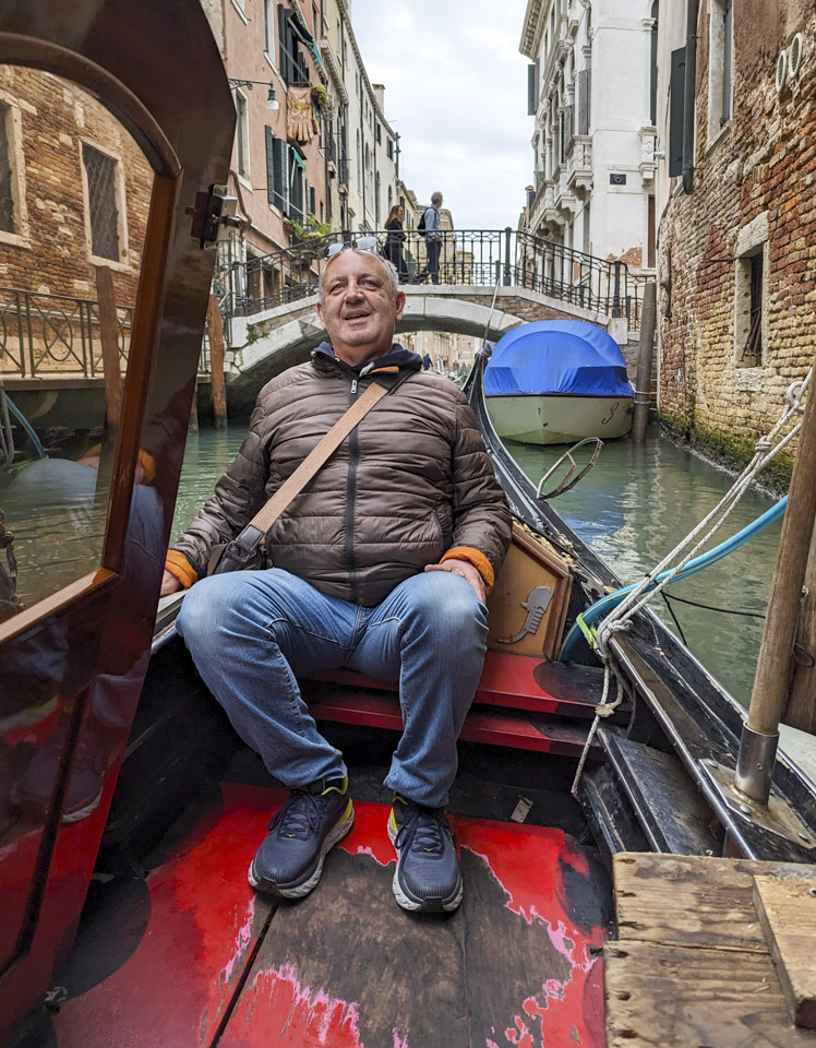 Francesco sitting in a gondola
