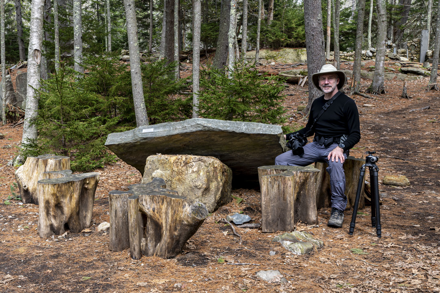 Paul sits at the Fairy Table, although the table has fallen off the supporting rock.