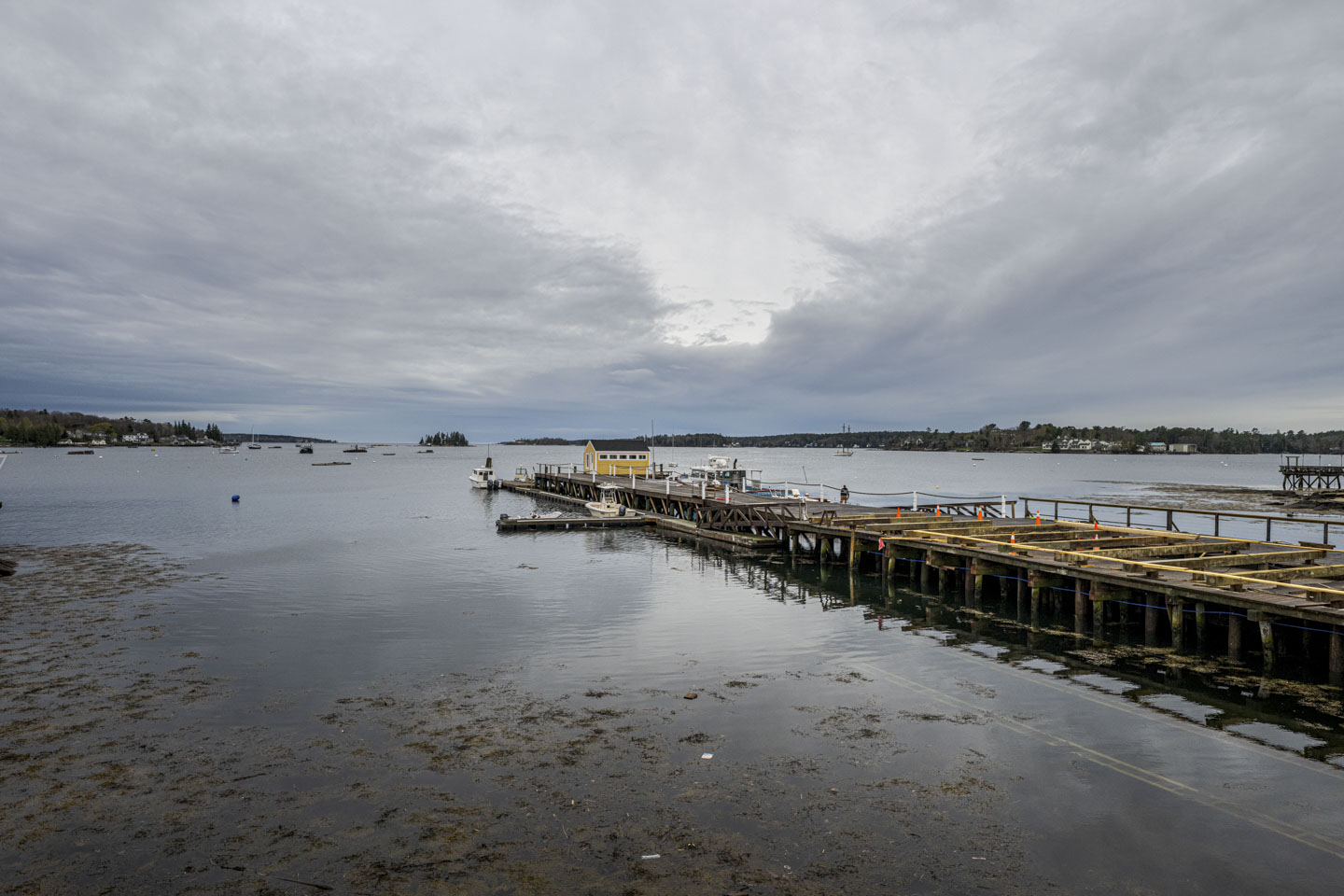 An expansive view of the boat repair shop dock extending into the harbor.