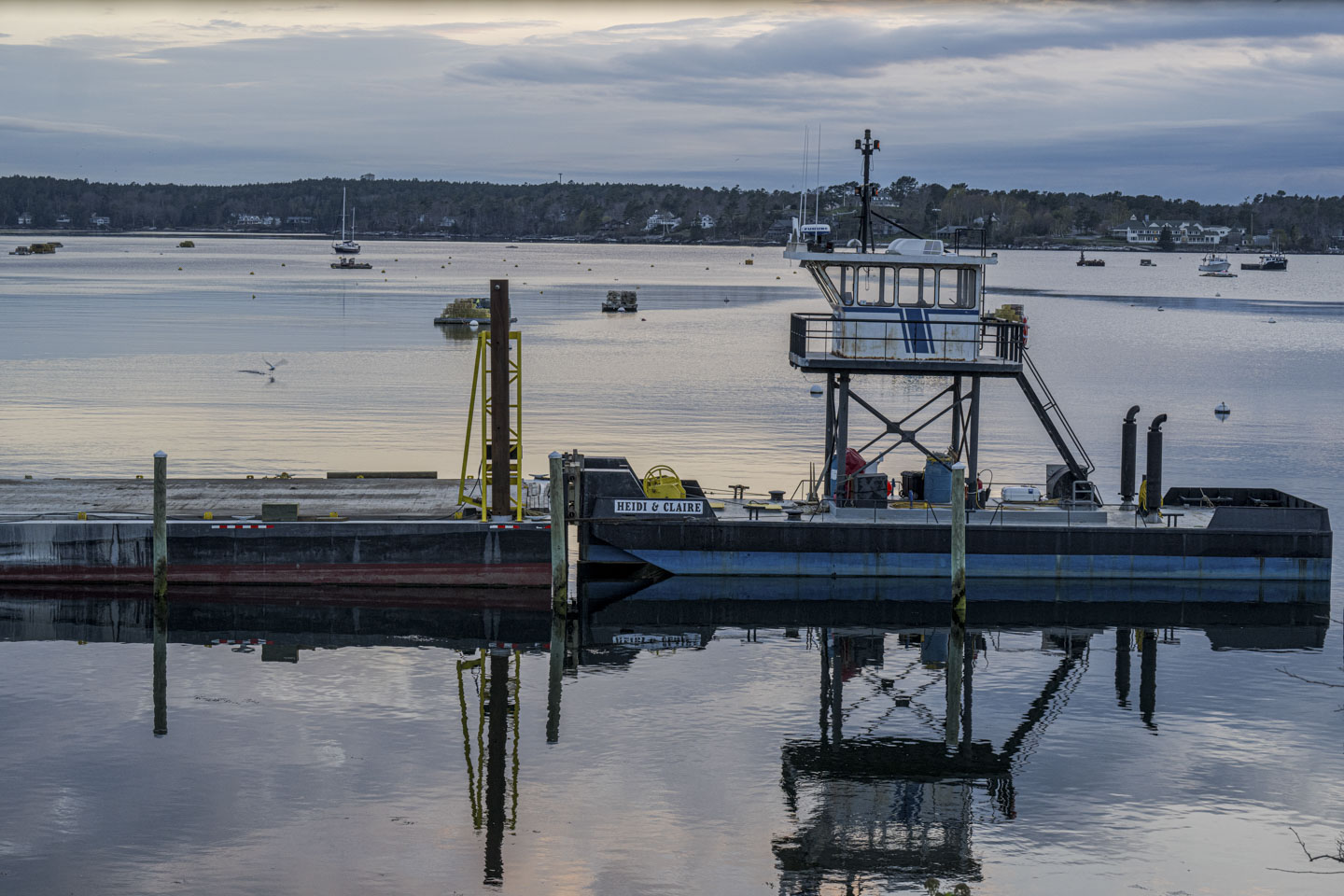 A tugboat and an empty float.