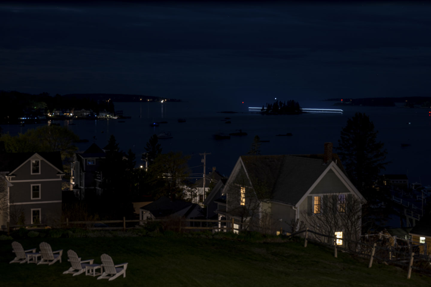 A darker picture of the same view, but with a bar of light going behind an island.