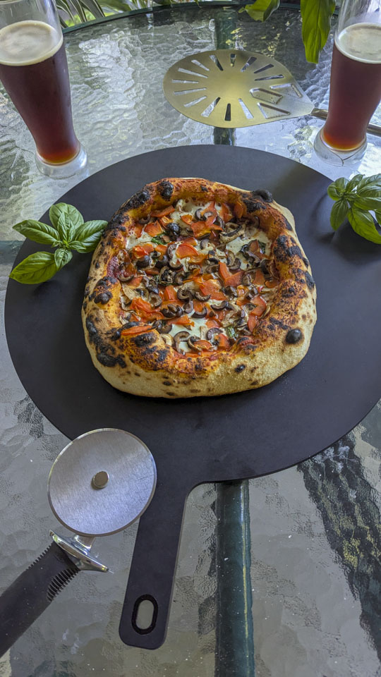A pizza with multiple toppings on it.